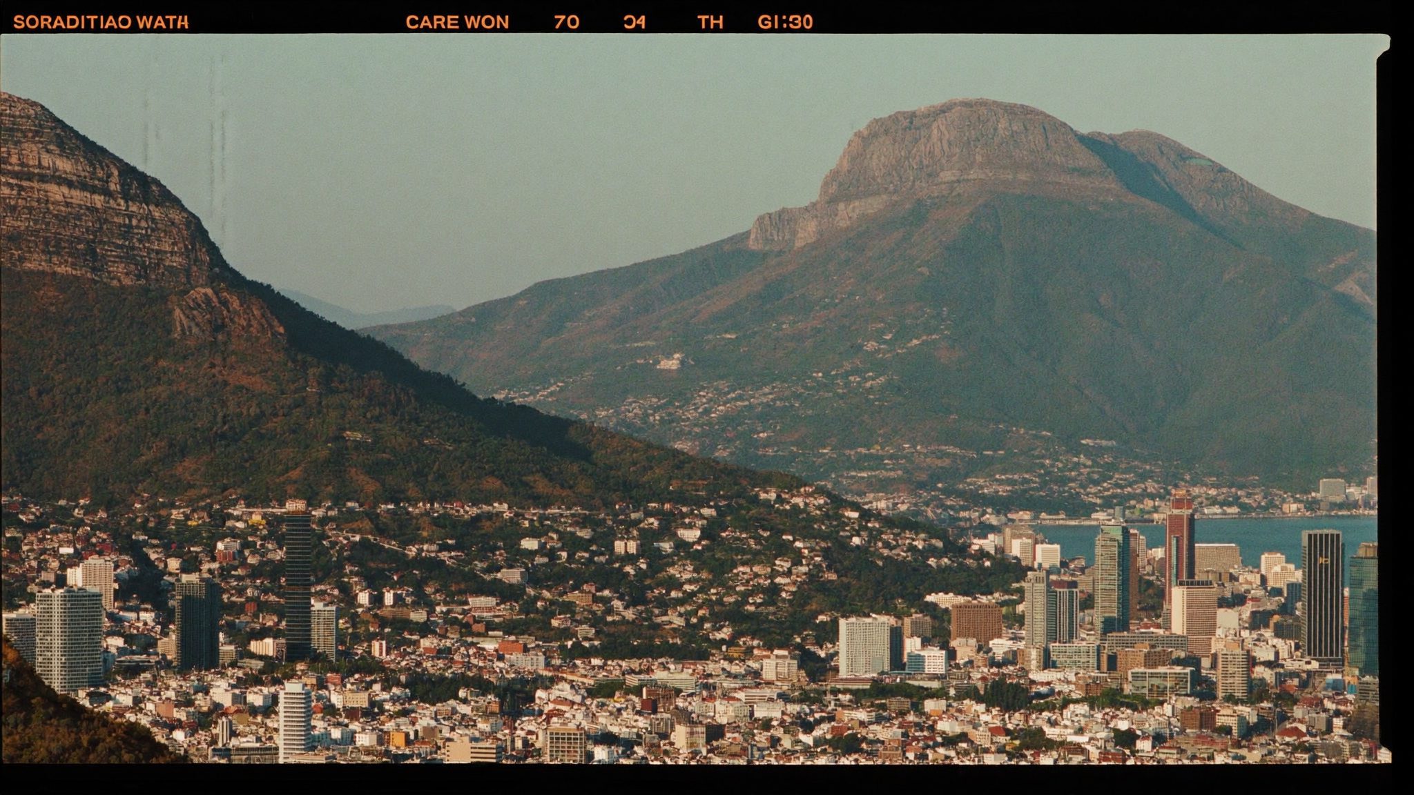 Cape Town cityscape with Table Mountain at dusk, seen from Elvaris & Co's Gardens office