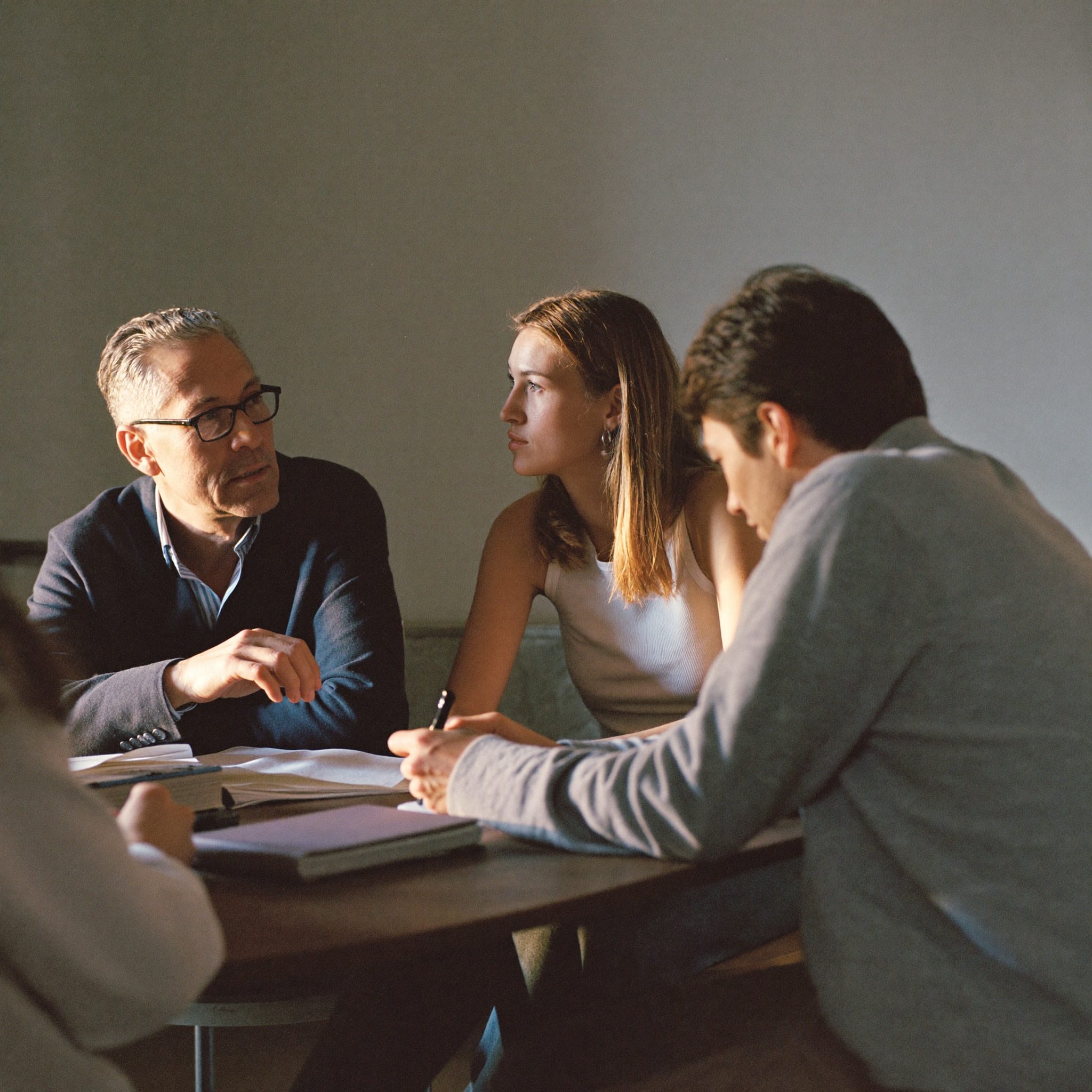 Three generations of a family in a shared planning meeting